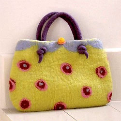comment réaliser un sac en laine cardée feutrée - Photo comment réaliser un sac en laine cardée feutrée - Photo