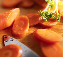 Noix de Saint Jacques, petits flans de carottes au coulis de persil